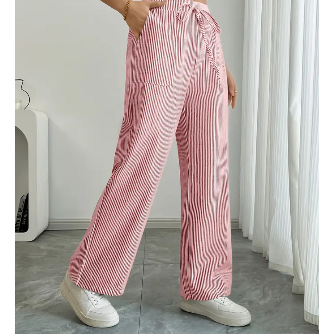 Women’s striped casual pants with easy-fit waistband on a plain background.