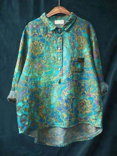 Feminine floral top against a clean background.