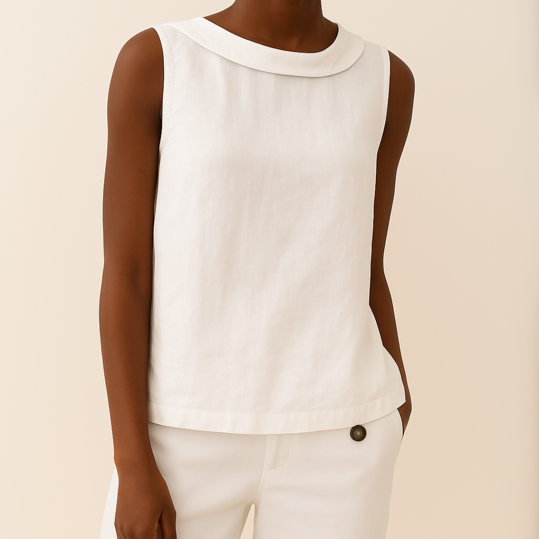 Sophisticated sleeveless top with soft roll collar worn by a person against a clean background.