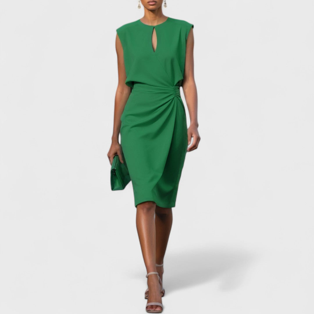 Refined women’s occasion dress with model on a plain background.