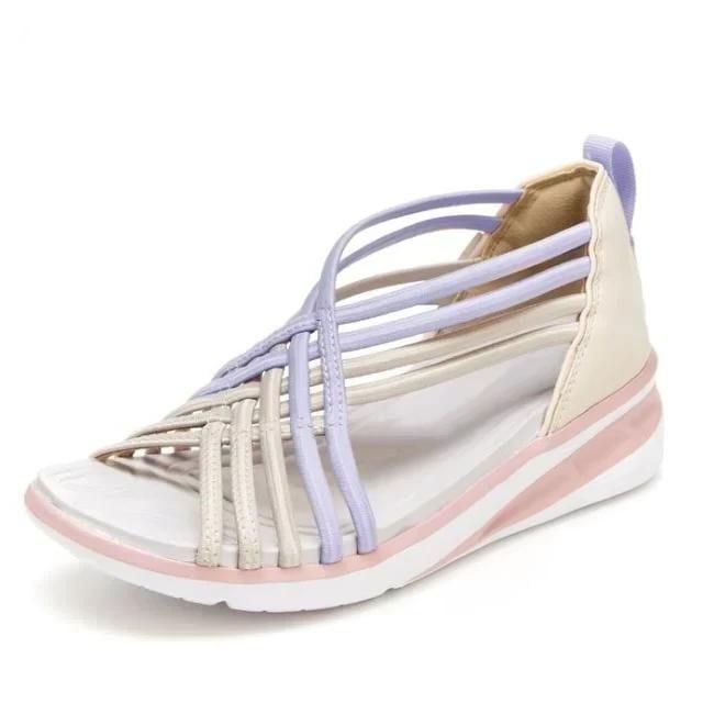 Cushioned spring sandals displayed on a plain background for all-day support.