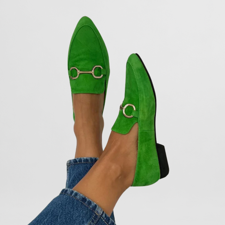 Colorful women’s boho moccasins shown on a plain background.