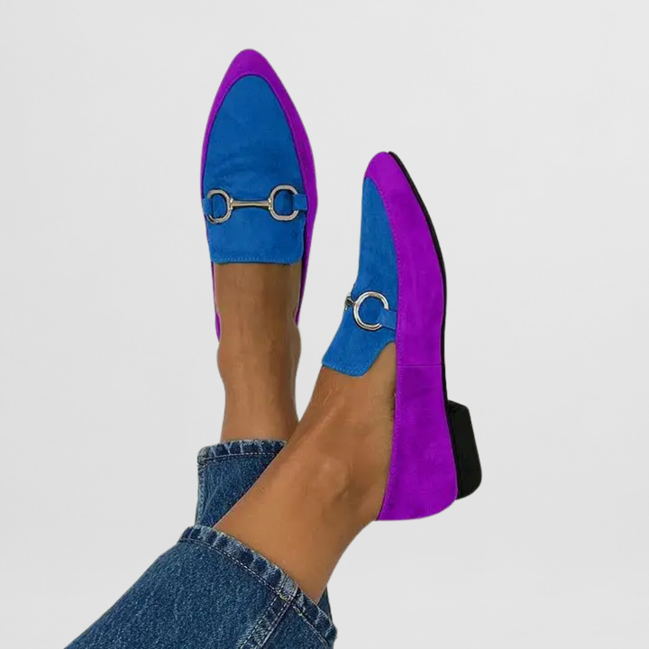 Boho-inspired women’s flats featuring artistic patterns on a plain background.