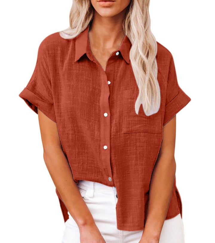Female figure in a relaxed button shirt with pocket detail on a clean background.
