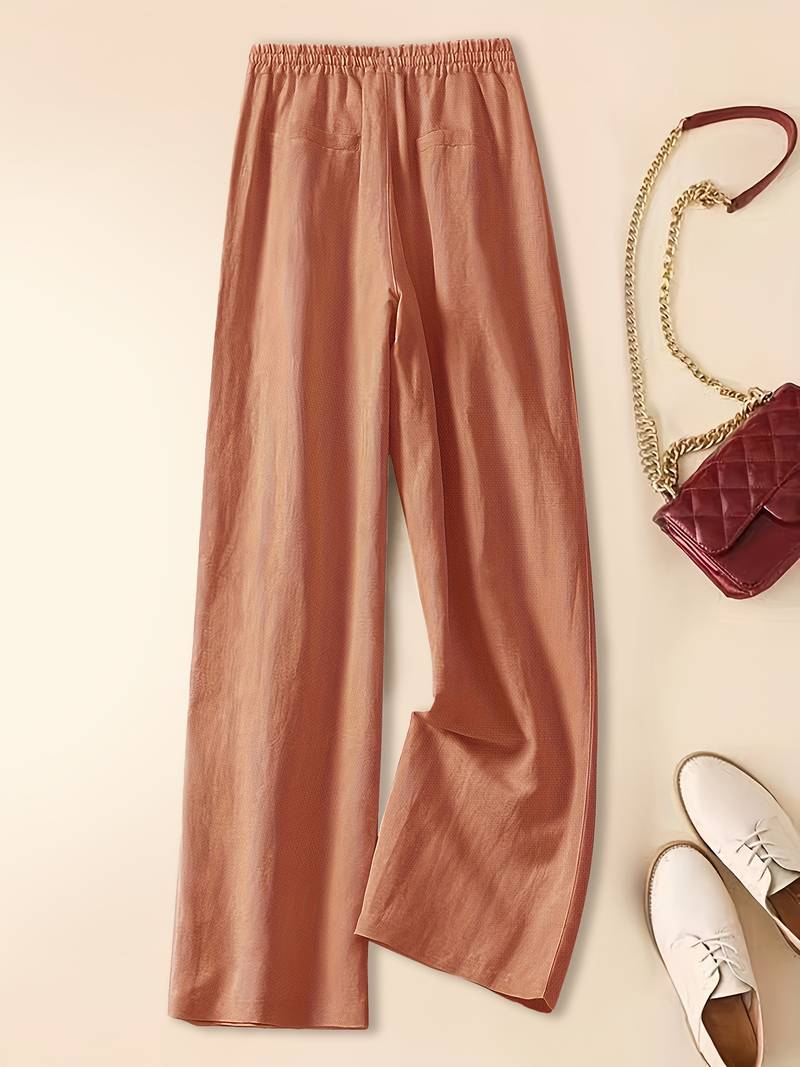 Lightweight drawstring pants for women displayed on a plain neutral background.
