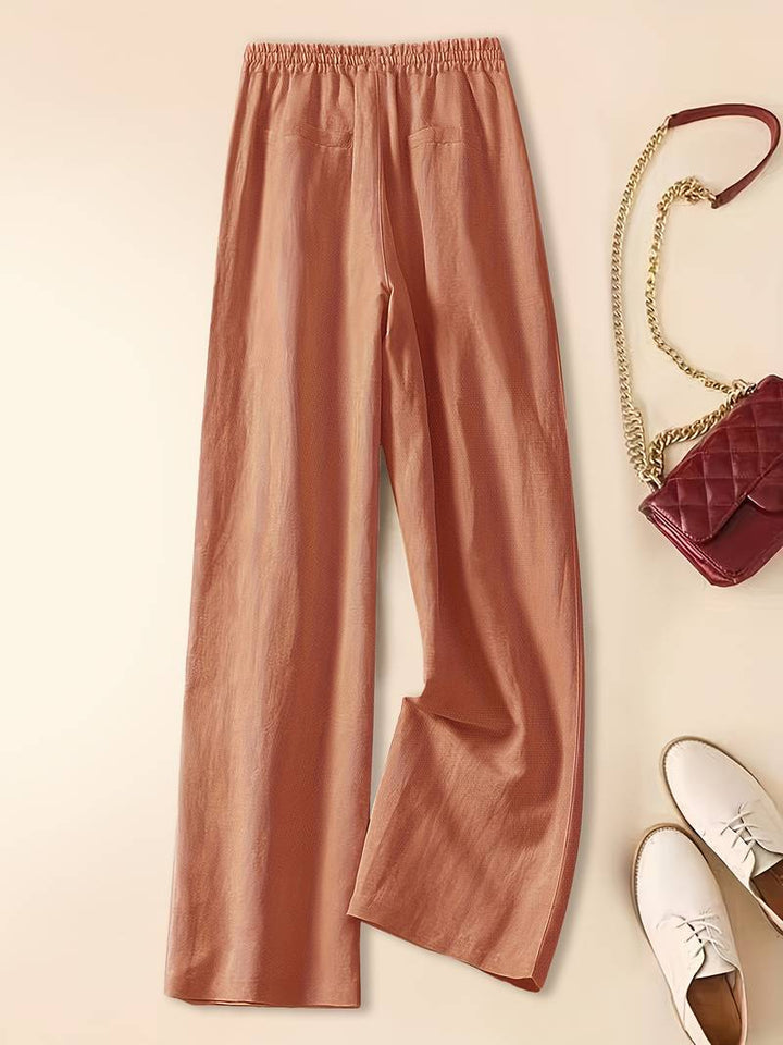 Lightweight drawstring pants for women displayed on a plain neutral background.