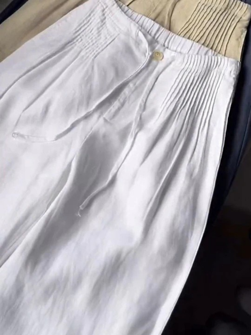Wide-leg pants photographed on a plain background for a clean product view.