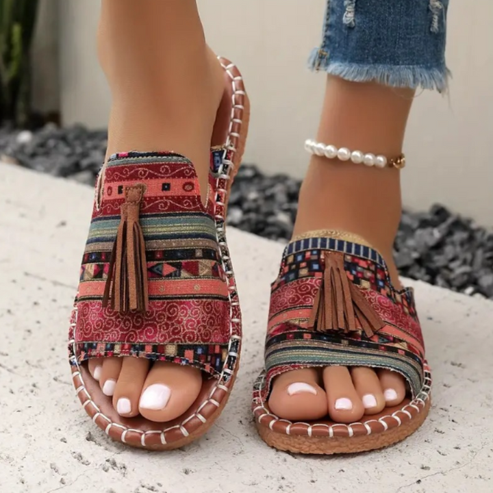 Colorful cushioned slip-on sandals displayed on a clean background for summer styling.