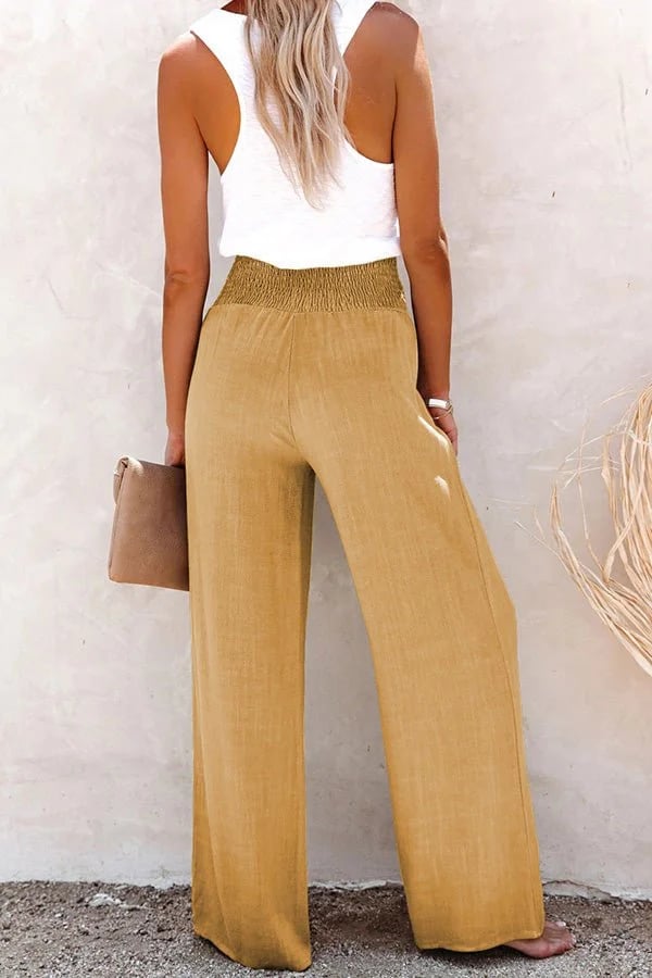 Women’s relaxed trousers with a high waist and flowing silhouette.