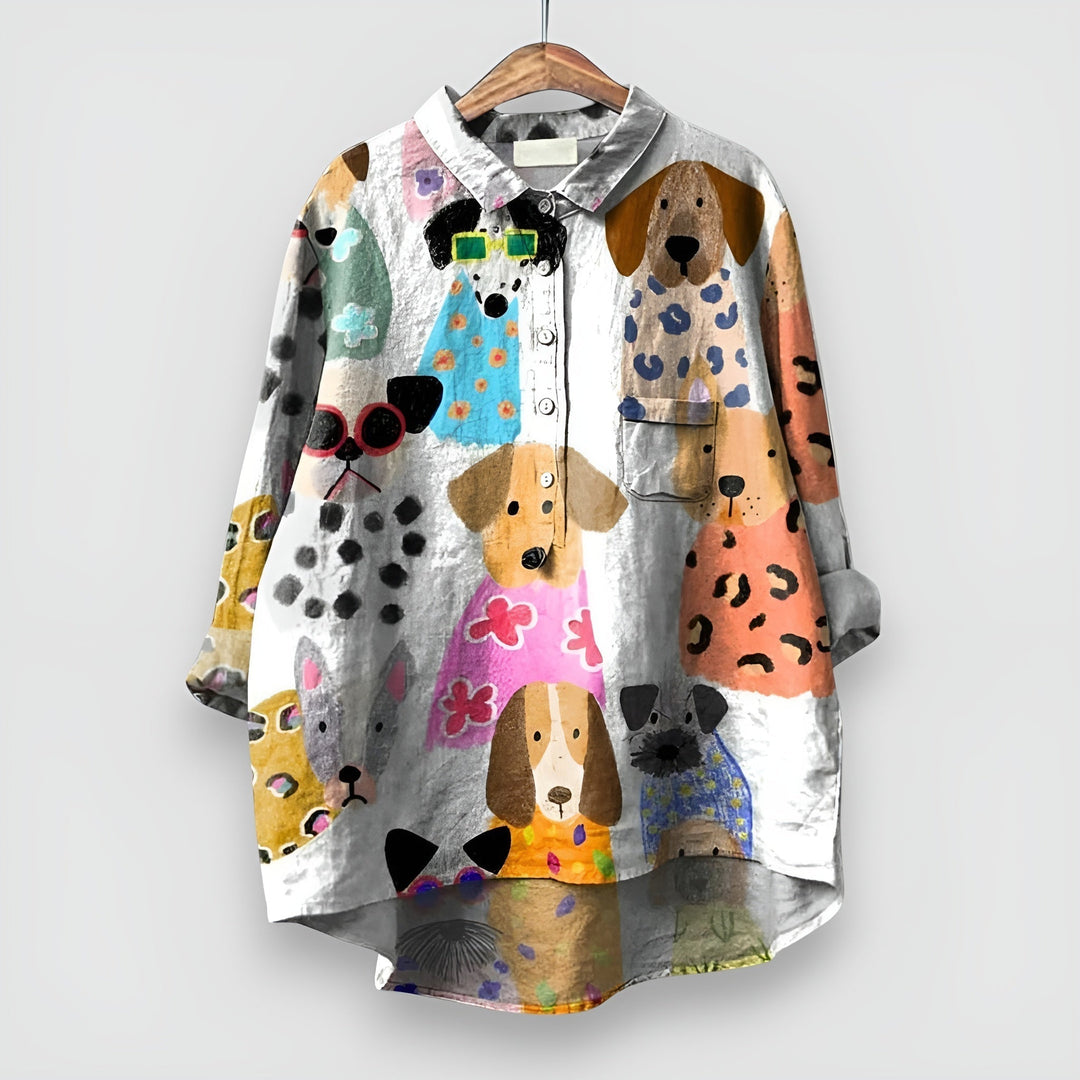Women’s dog print shirt displayed on a clean background with a relaxed casual silhouette.