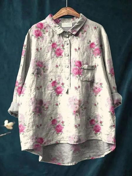 Soft floral women’s blouse with a clean background.