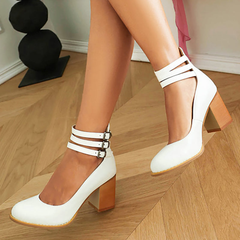 Close-up of a foot in a smooth finish block heel sandal.