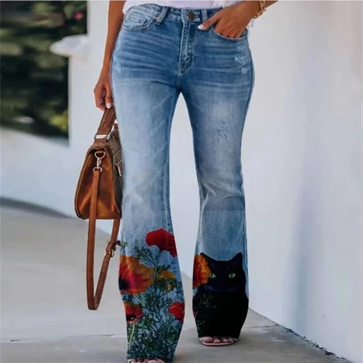 Casual floral jeans displayed without a model on a plain backdrop.