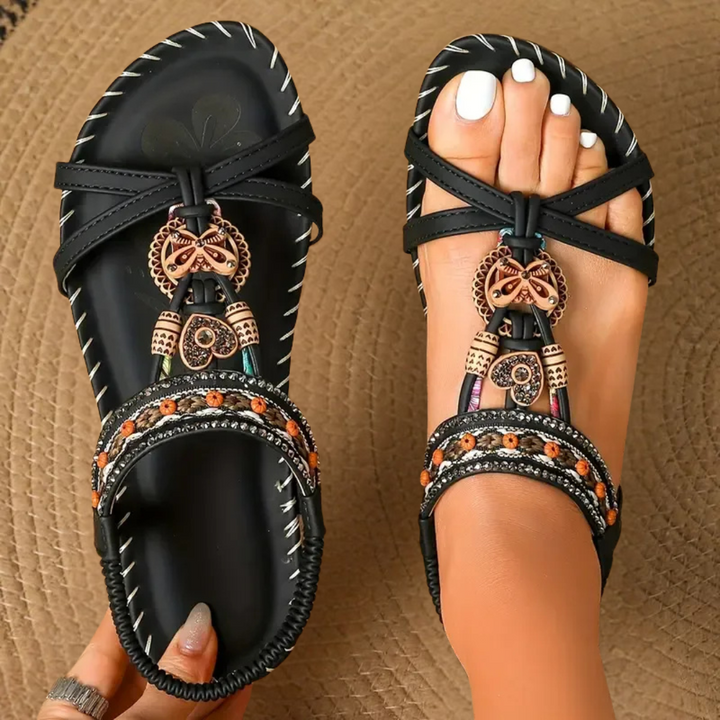 Comfortable walking sandals displayed on foot against a plain background.