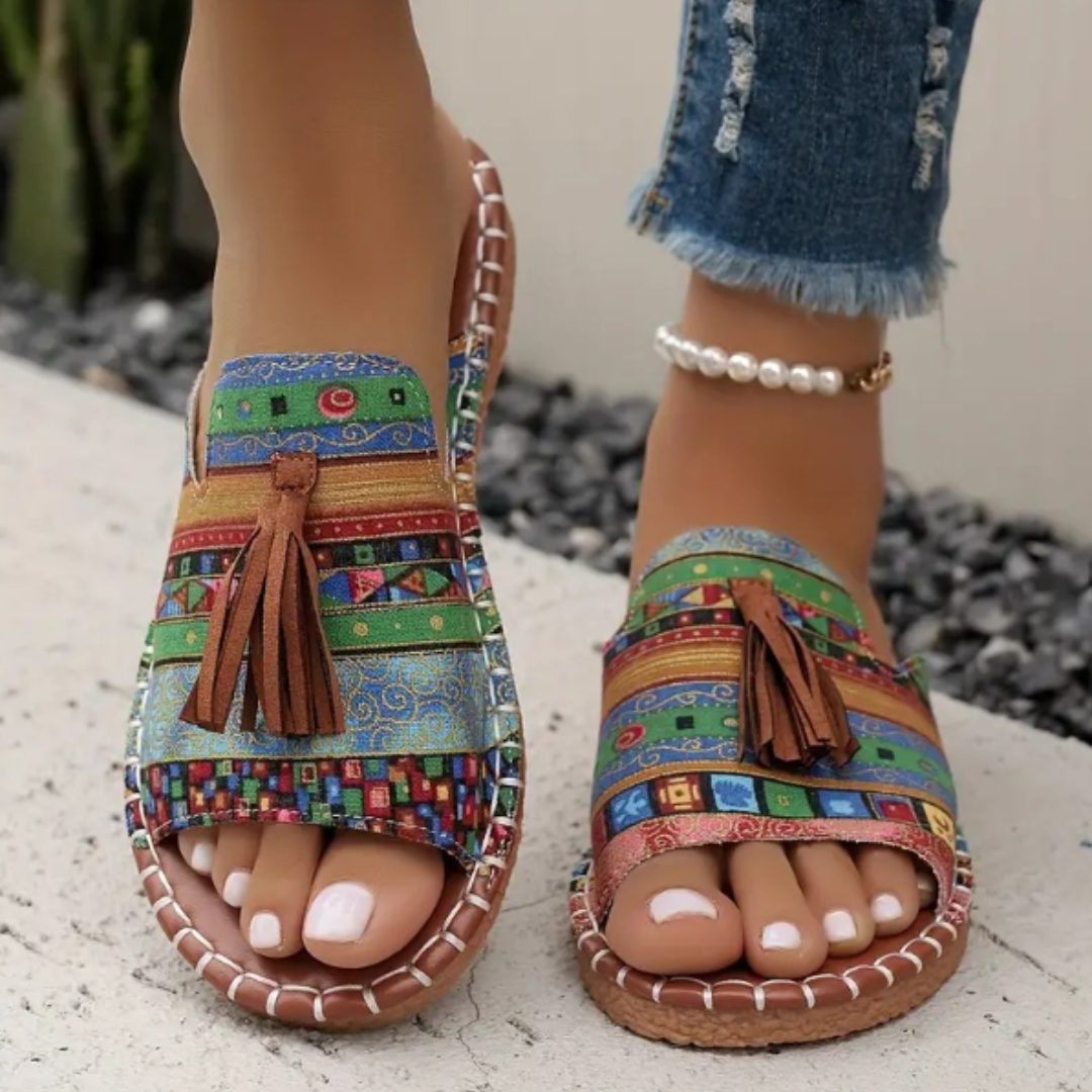 Comfortable casual sandals with colorful design displayed on a clean background.