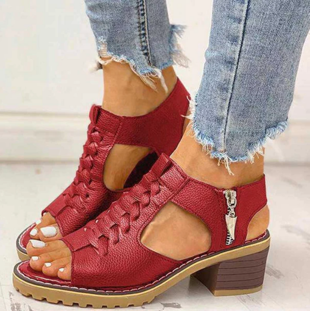 Stylish high heel sandals featuring cushioned soles shown with feet only on a clean background
