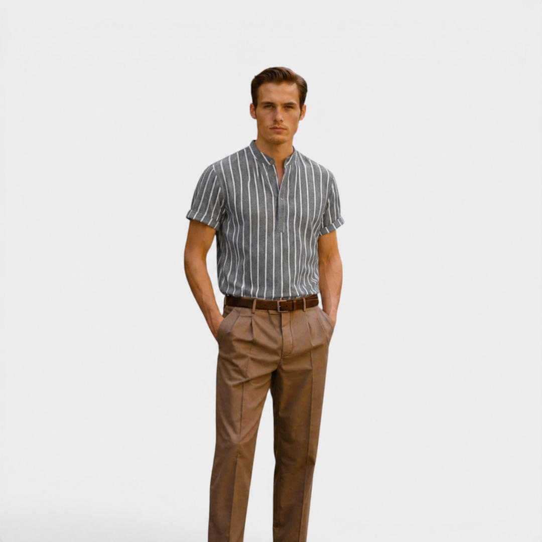 Male model presenting a lightweight summer polo shirt on a plain background.