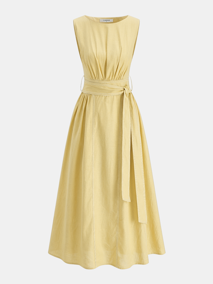 Female model showcasing a belted midi dress with a neat sleeveless cut on a plain background.