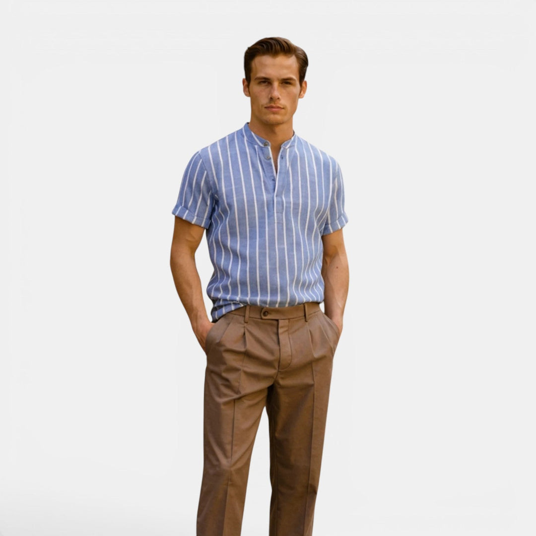 Male model wearing a lightweight linen polo shirt against a plain background.