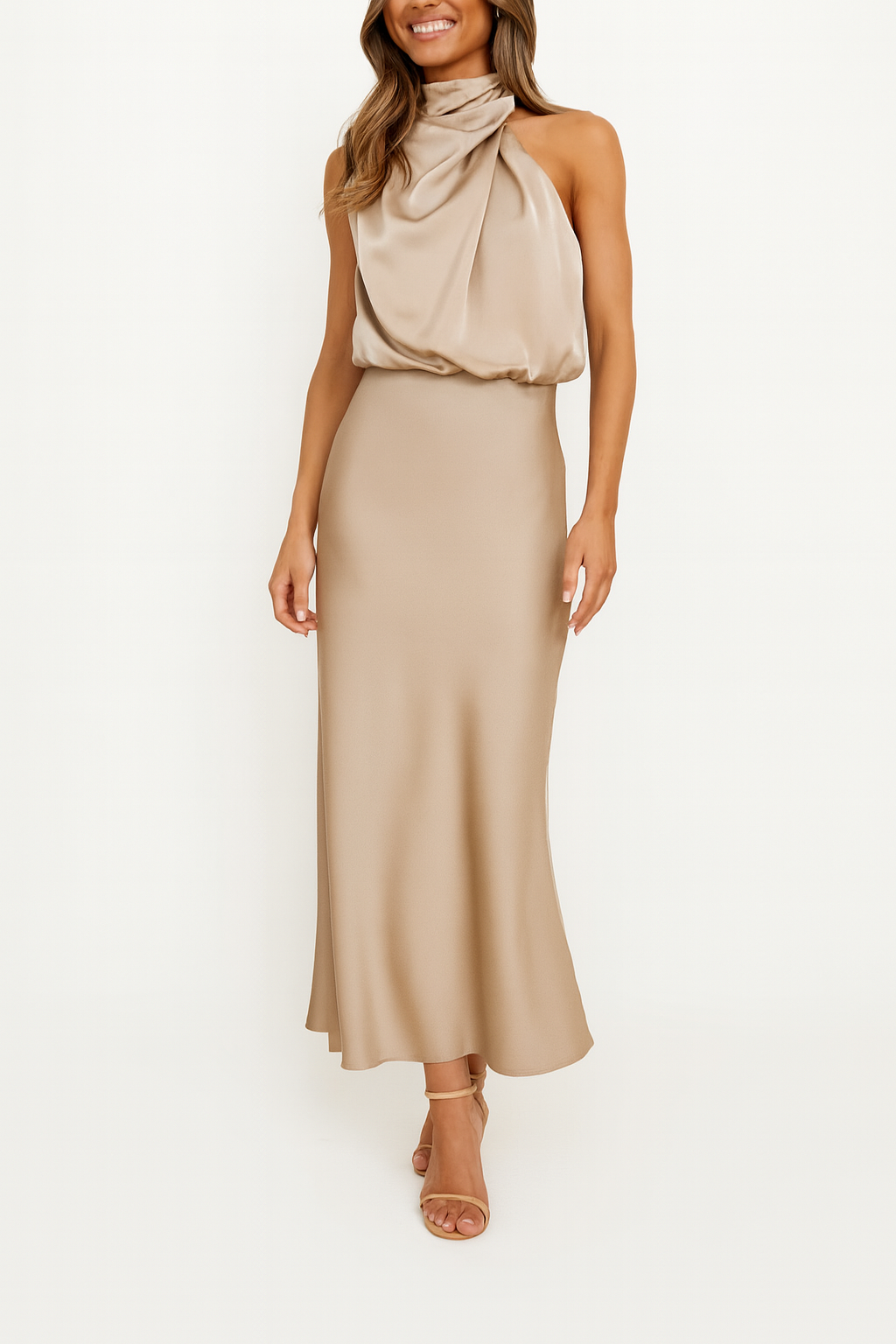 Female model in an elegant off-shoulder midi dress against a plain background.