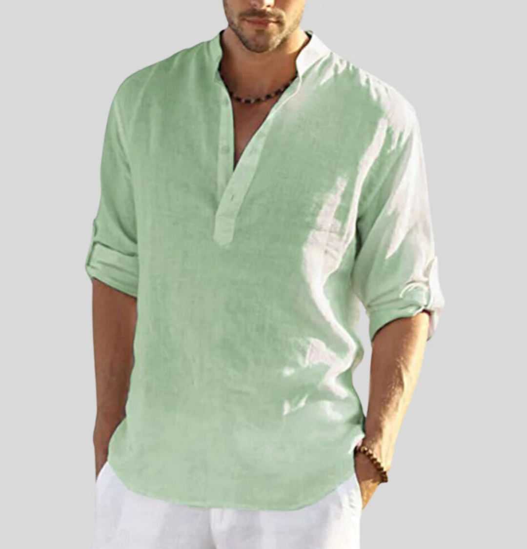  Male model in a breathable warm-weather shirt on a plain background