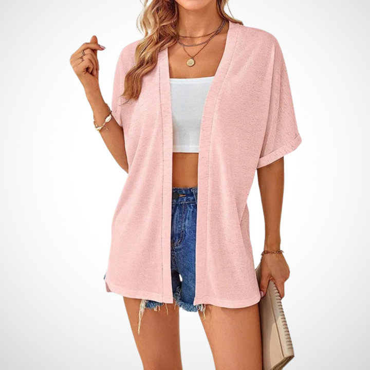 Simple draped cardigan with open front displayed on plain background.