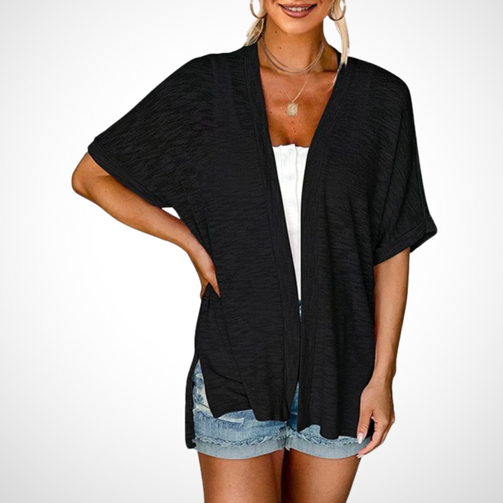 Lightweight open-front cardigan with flowing shape on a plain background.