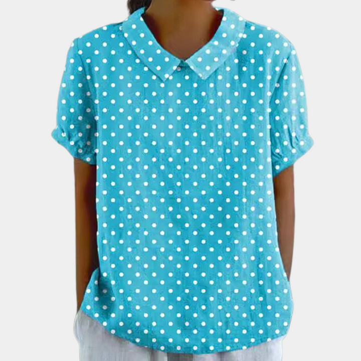 Front angle blouse slightly tilted showing neckline and sleeve style