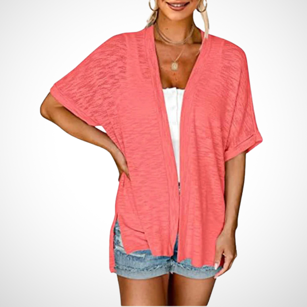 Easy layering cardigan with soft drape shown on a clean background.
