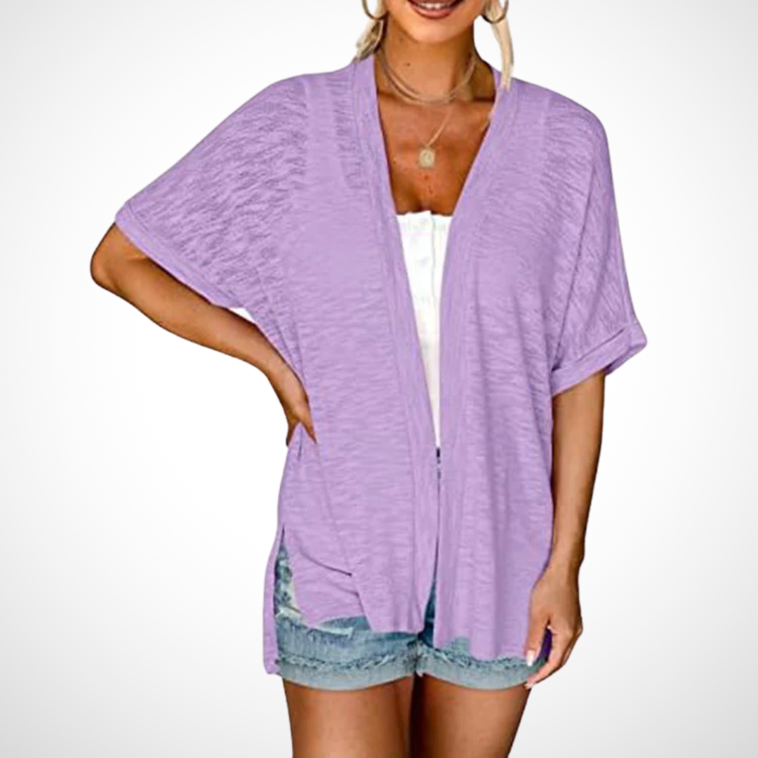 Flowing fit cardigan designed for layering on a clean background.