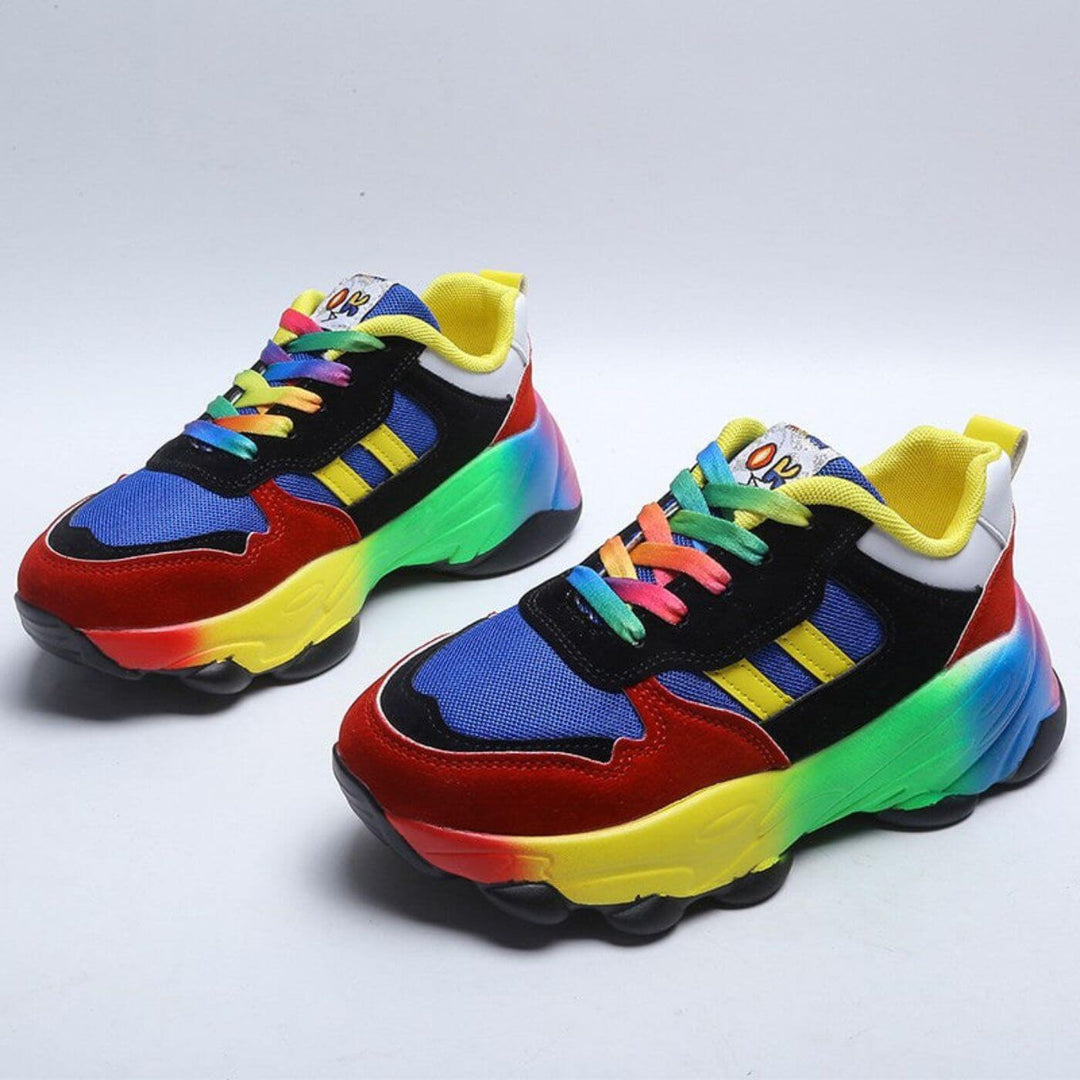 Cushioned lace-up sneakers on a plain background.
