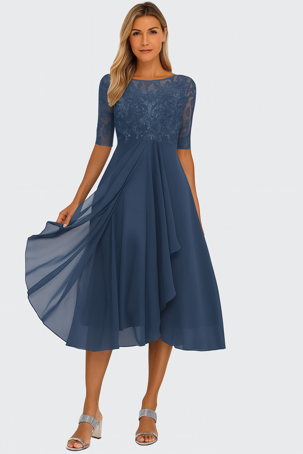 Woman wearing a midi dress with delicate upper detail on a plain background.