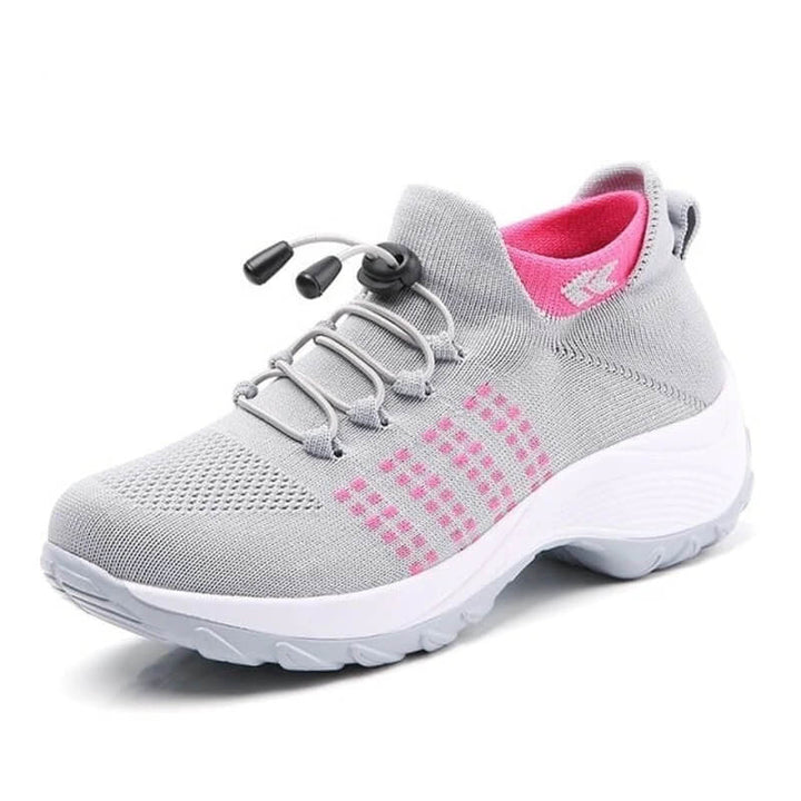 Casual shoes on a plain background.