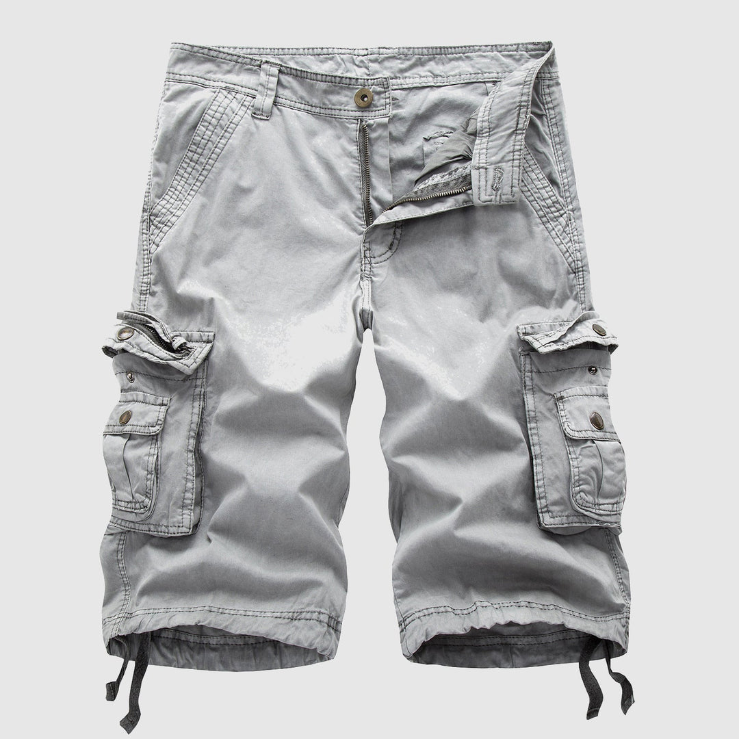Vintage-inspired cargo shorts with a loose silhouette on a plain background.