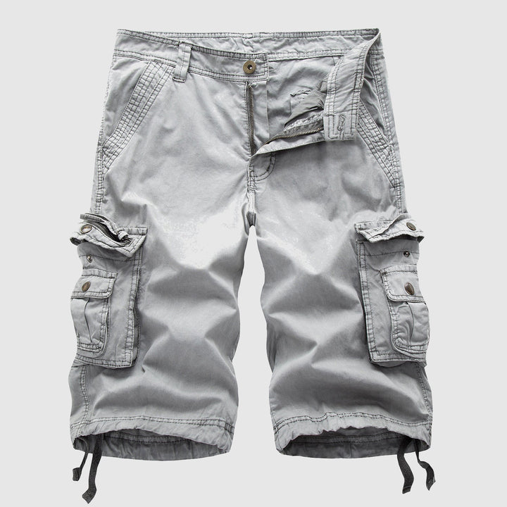 Vintage-inspired cargo shorts with a loose silhouette on a plain background.
