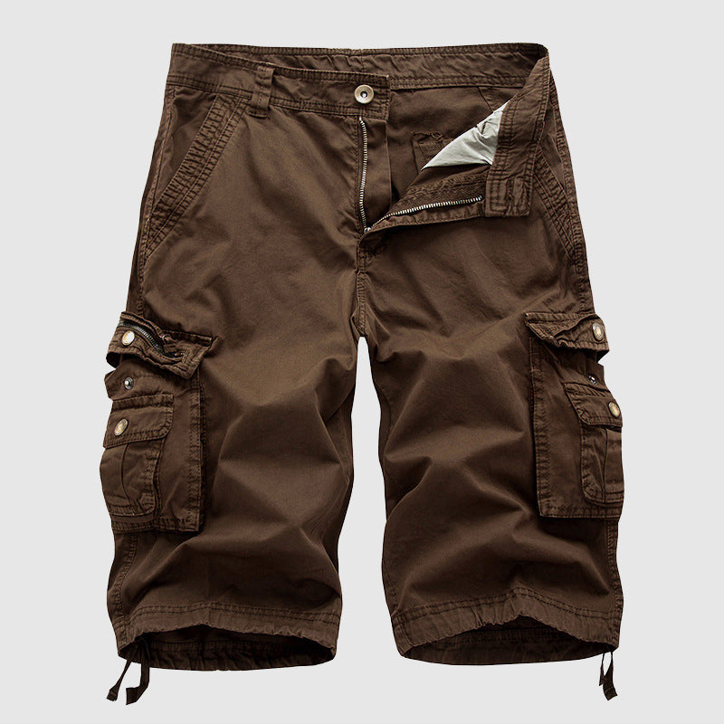 Casual cargo shorts with spacious storage pockets against a plain background.