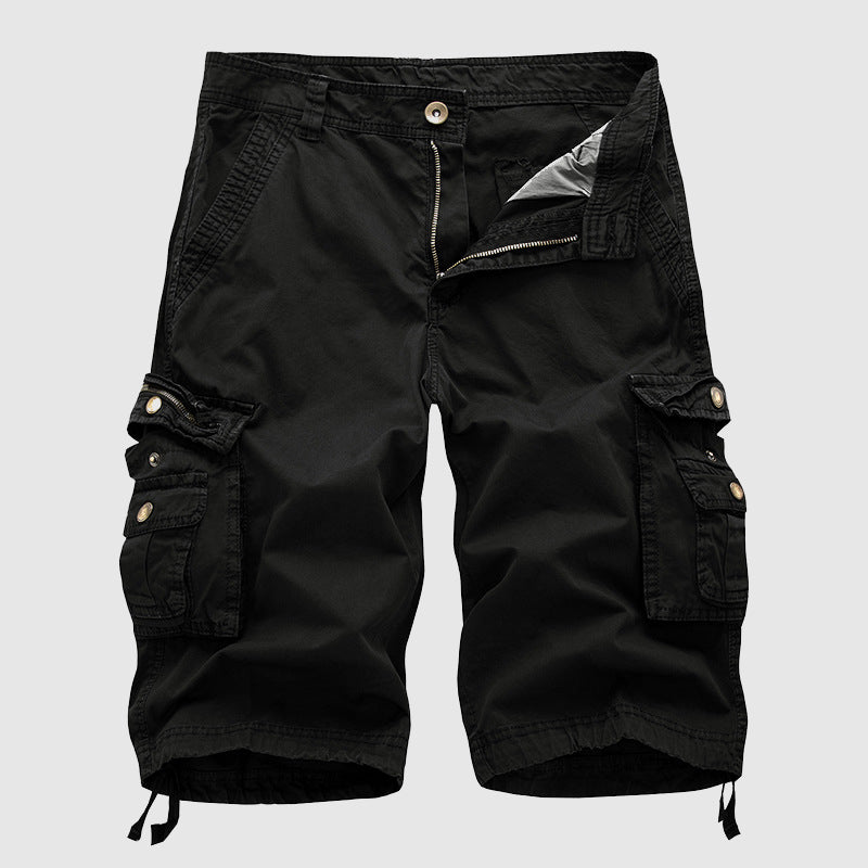 Relaxed fit utility shorts on a plain background.