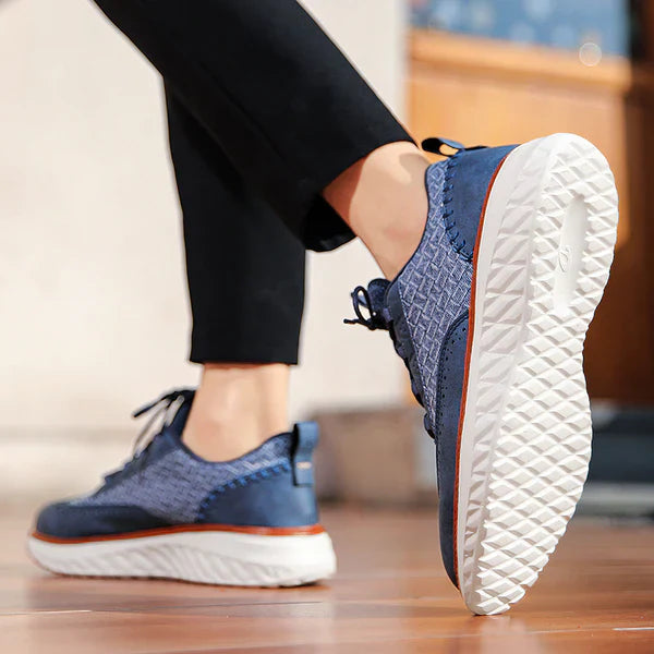Everyday walking sneakers against a plain background.