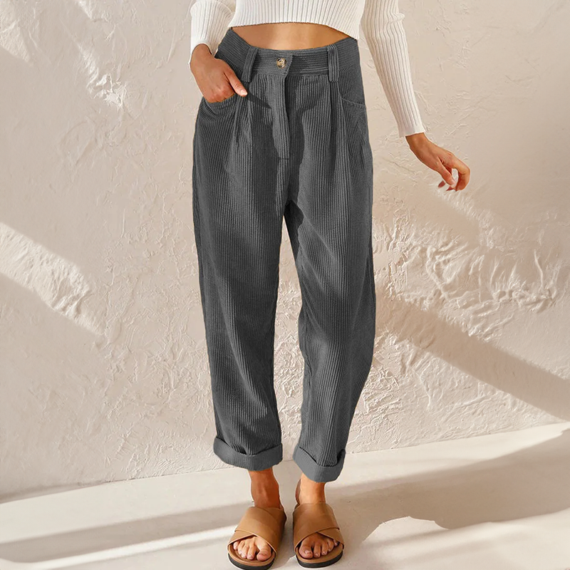 Model wearing vintage-inspired high waist corduroy pants on a clean background.