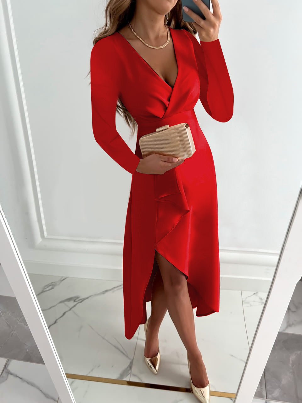 Female model wearing an elegant V neck midi dress for warm-weather occasions on a plain background.