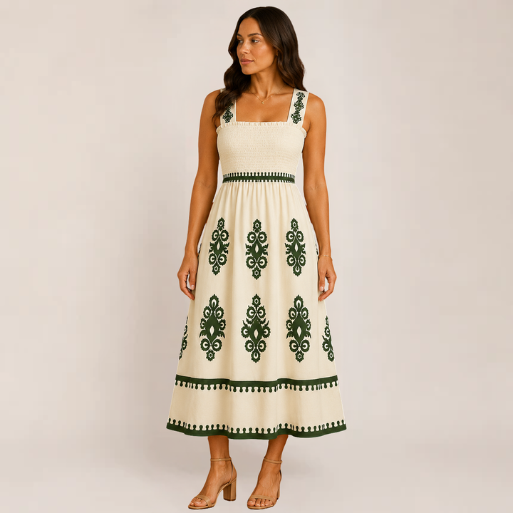 Woman wearing a sleeveless long dress styled for casual seasonal outfits on a plain background.