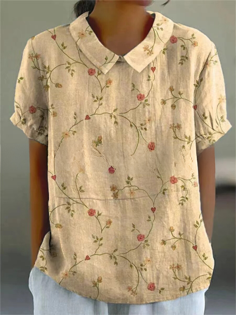 Breathable floral shirt for women shown with graceful sleeve coverage.