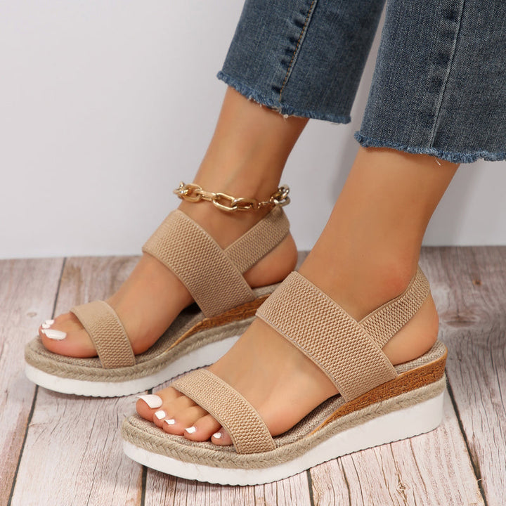 Stable sandals with cushioned sole and clean refined silhouette.