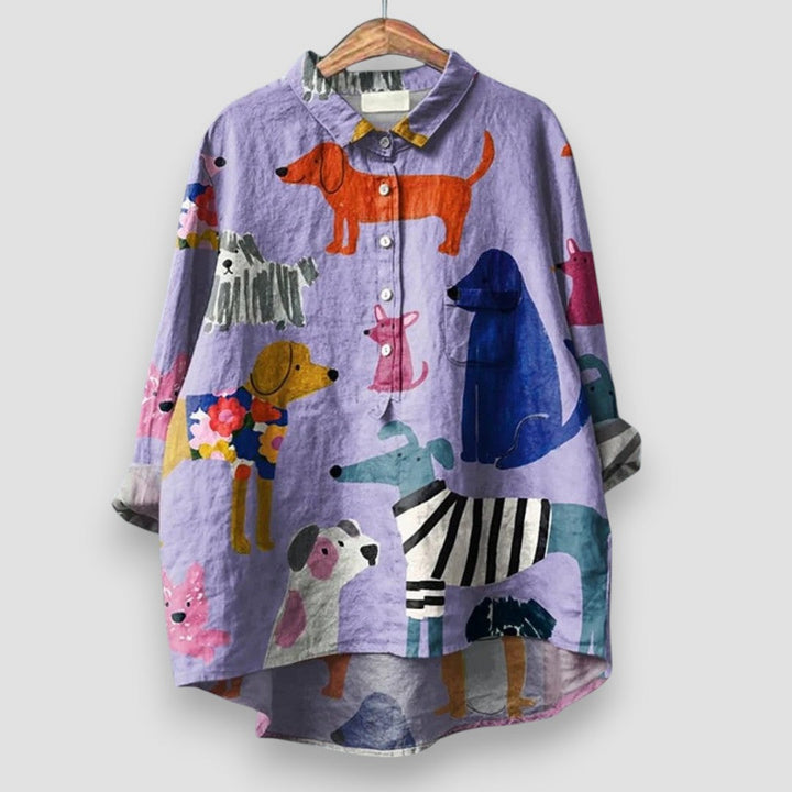 Relaxed fit women’s animal print shirt shown on a plain background.