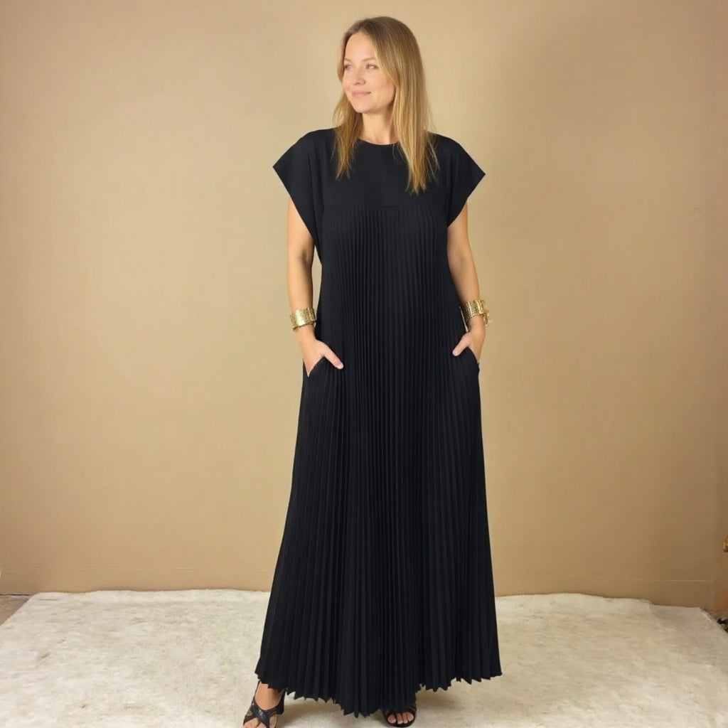 Long sleeveless maxi dress shown on a female model against a plain backdrop.
