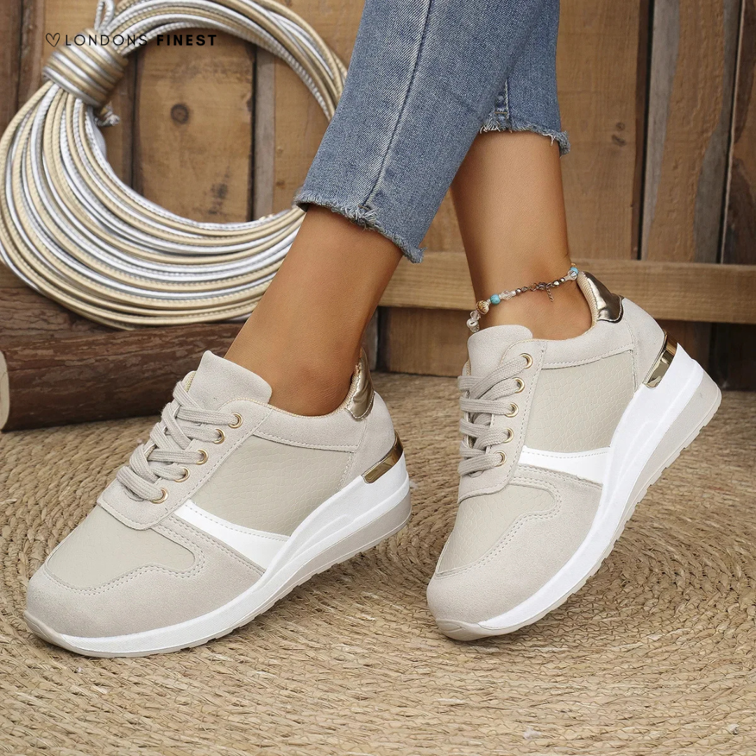 Women’s slip-on walking shoes displayed on a plain background.