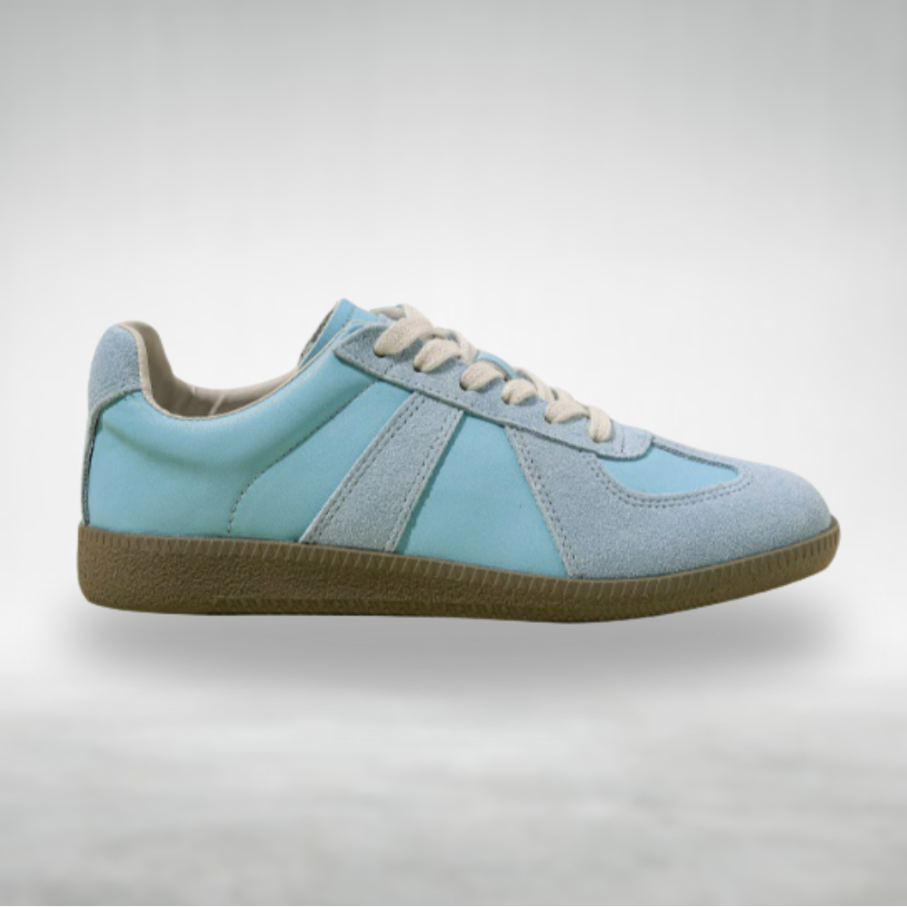 Slip-on daily wear shoes displayed on a plain background.