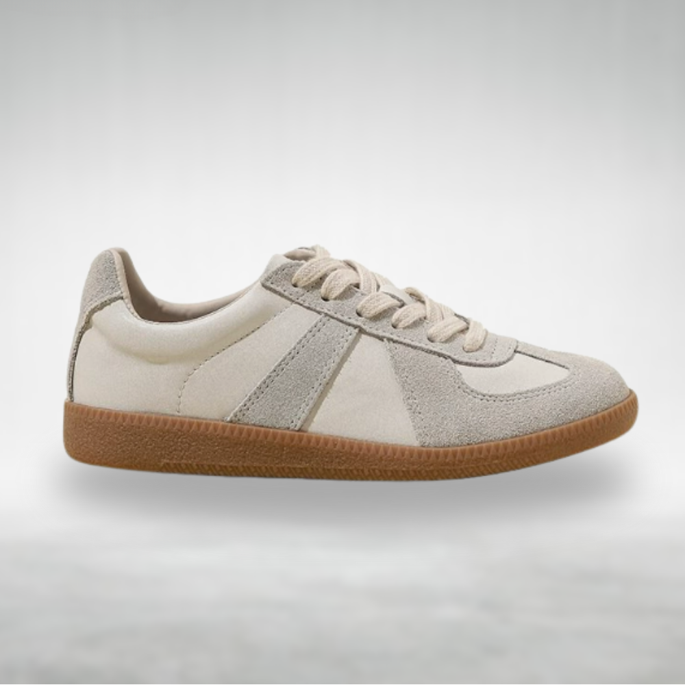 Women’s walking shoes displayed on a plain background with a clean everyday style.