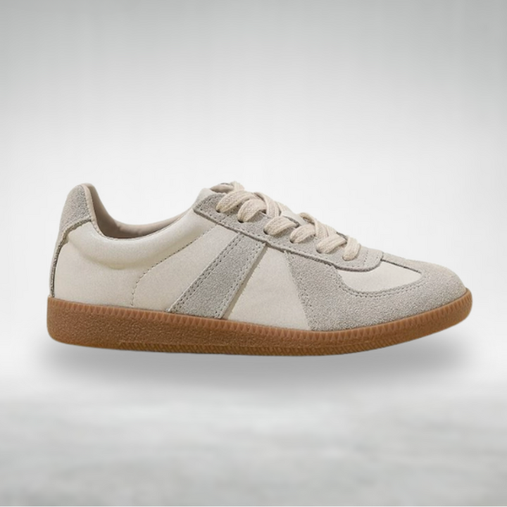 Women’s walking shoes displayed on a plain background with a clean everyday style.