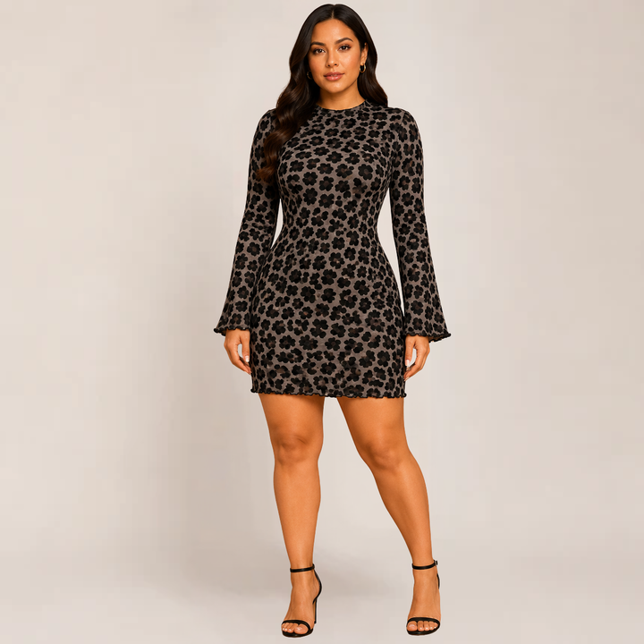 Female model styled in a bold animal print bodycon dress with a plain background.
